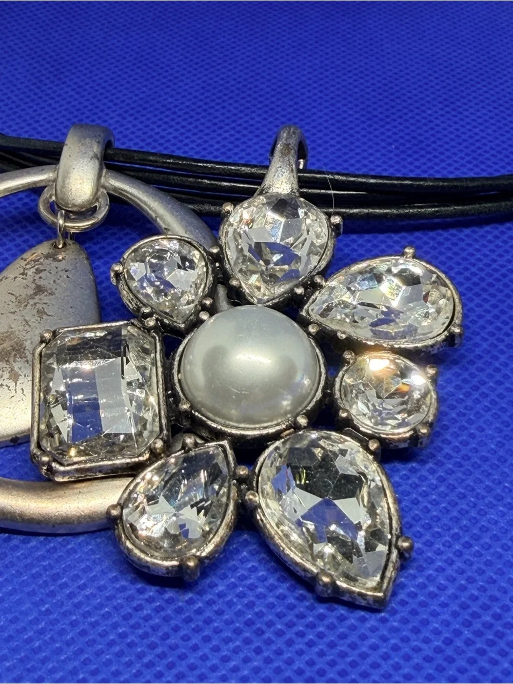 Silver Flower Pendant Necklace with Black Cord and Clear Accents